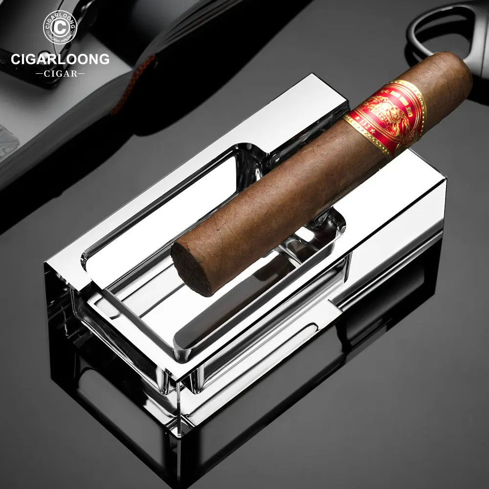 Cigar on a Cigarloong cigar cutter with a dark background