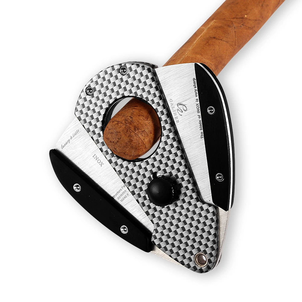 Cigar cutter with checkered pattern and wooden handle on a white background