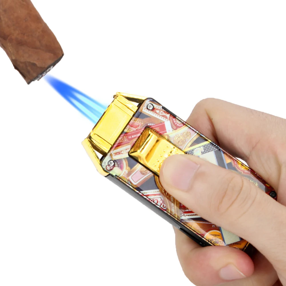 Hand holding a gold lighter with a colorful design, igniting it on a white background