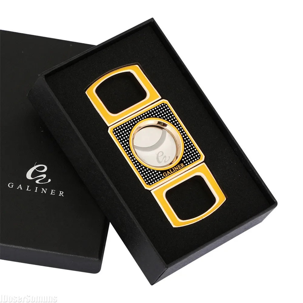 Yellow and black cigar cutter in a black box.